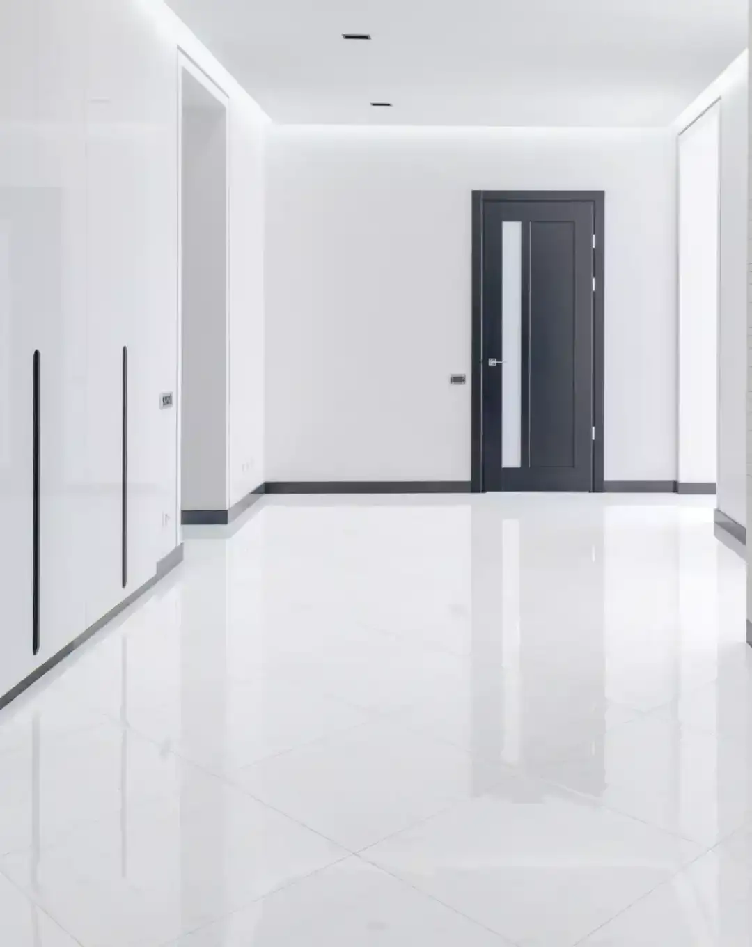 ASBL Springs corridor flooring spec image featuring vitrified tiles in common areas